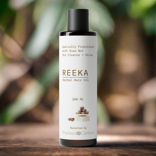 Reeka Herbal Hair Oil bottle on a white background